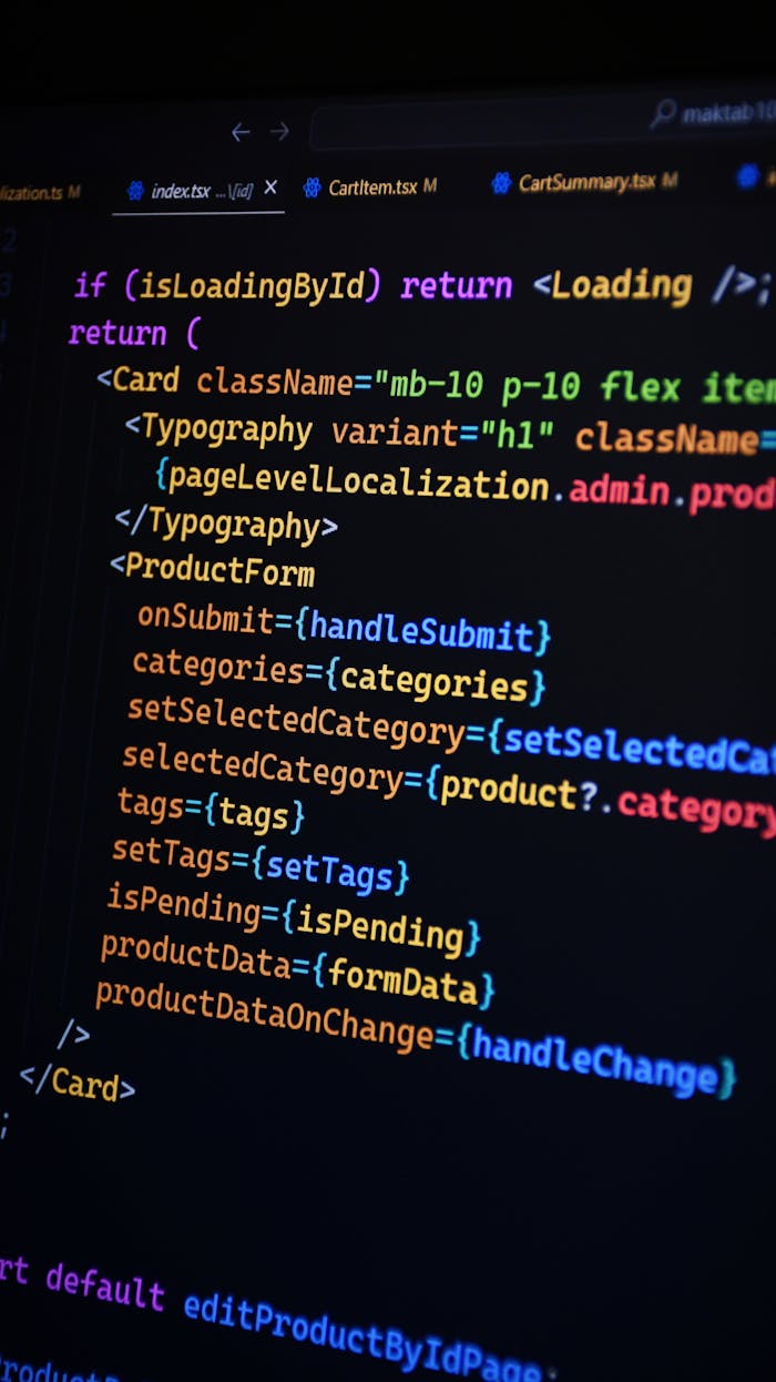 gallery-4 Close-up of JSX code on a monitor, showcasing colorful syntax used in ReactJS development.
